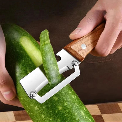 Elevate Your Cooking with Our Stainless Steel Vegetable Peeler Featuring a Comfortable Wooden Handle – Perfect for Effortless Peeling and Slicing!